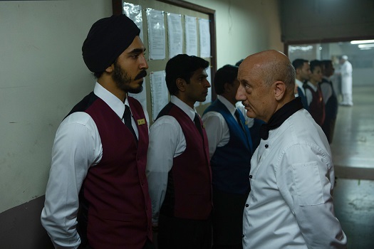 Dev Patel (left) as ’Arjun’ and Anupam Kher (right) as ’Oberoi’ in director Anthony Maras’ HOTEL MUMBAI, a Bleecker Street release.